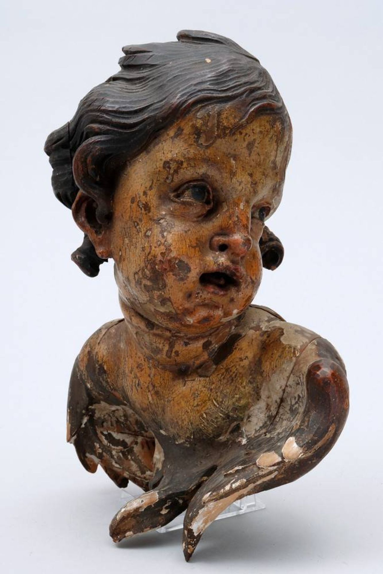 Bust of a cherubposs. south german, baroque, carved wood, painted in colours, H 25cm, paint loss