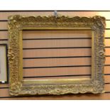 A large antique gilt Gesso picture frame