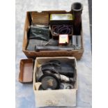 A mixed collection of items to include tins, leather holsters, ice skates, clock, telephone etc