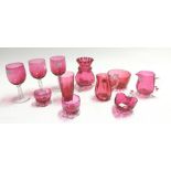 Stourbridge cranberry glass vessels to include wine glasses x 3, jugs x 3, bowls x 3 and a vase