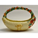A Clarice Cliff style Newport pottery fruit basket, in the Celtic Harvest design, with Christies