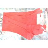 A pair of Royal Household red wool stockings, 1860's, probably worn by Queen Victoria, formerly