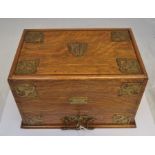 A lockable Edwardian travelling writing box and cabinets