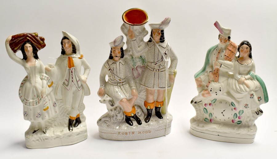 A collection of three Staffordshire flatbacks, all figural, in groups of two. (3) - Image 2 of 2