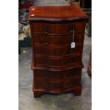 A 20th Century mahogany small chest on chest type