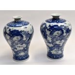 A pair of Chinese blue and white vases of inverted baluster form, 27cm high complete with