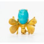 A continental 18ct gold bee brooch, the body set with an oval turquoise the wings with textured