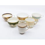 Collection of early 19th Century Derby cups, some with saucers, including Duesbury Imari pattern