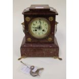 A French Rouge marble mantel clock, silver medallion, Vicenti and Cie, 1855 on the movement, with