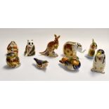 A collection of Royal Crown Derby animal paperweights to include duck, owl, wren, duck billed
