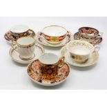 A collection of early to mid 19th Century Derby tea and coffee cups with saucers, from Nottingham