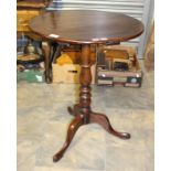 A 19th Century oak wine table.