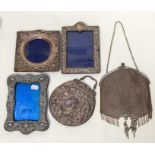 Three dated photo frames, a mirror with no glass, and a 1920's chainmail purse/evening bag