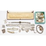 A 19th century gilt metal watch key; silver charm bracelet with charms, approx 2ozt; a white metal