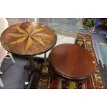 A late 19th century mahogany inlay occasional table, circular top with a star burst inlay, barley