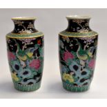 A pair of Chinese Empire baluster vases, initialled to base. Height approx 30cm