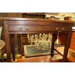 A 20th Century oak hall table with a single drawer