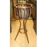 A bentwood plant stand,