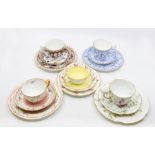 Five early 20th Century Royal Crown Derby trios, comprising cups, saucers and side plates Condition: