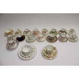 A collection of Crown Derby and Royal Crown Derby tea cups and saucers, mostly mid 19th Century