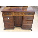 A George III mahogany kneehole desk, circa 1820, rectangular moulded top, four graduate drawers each