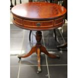 A small mahogany drum table.