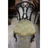 A Victorian walnut carved balloon back chair (A/F)