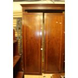 A late Victorian mahogany and boxwood inlay wardrobe, fitted with two panel doors. H 238cm, W 155cm,