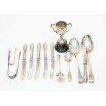 A small parcel of assorted antique silver flatware and a miniature trophy
