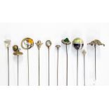 Hat pins- A collection of ten assorted hat pins to include a 19th Century continental porcelain