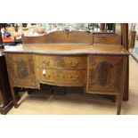 A 19th Century style mahogany sideboard, carved gallery, rectangular shape with a bow front at the
