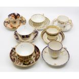 A collection of early Derby and Bloor Derby period tea cups and saucers, of different patterns,
