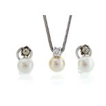 A pearl and diamond set 18ct white gold pendant and earrings suite, comprising a single cultured