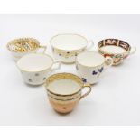 Twelve early 19th Century Derby tea cups