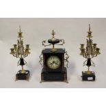 A stunning French black slate with red marble inserts clock garniture. With Rolsen-Paris on the