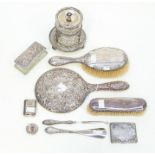 A mixed collection of dressing table set to include mirror, brushes, shoe horn, button hook, box and