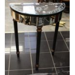 A modern demi-lune shape painted mahogany and mirrored inlay hall table, raised on turned taper