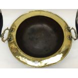 A large early 19th Century deep copper dish, possibly for keeping warm/ hot foods or liquid, Regency
