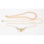 An Art Deco yellow metal necklace set central opal, together with a coral necklace and simulated