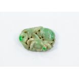 A jadeite oval pendant, pierced and carved with flower and fruit, approx 32mm x 23mm, gross weight