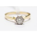 A diamond solitaire 18ct gold ring, the diamond approx. 0.40ct illusion set within a platinum