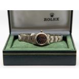 Rolex- A ladies Rolex Oyster perpetual steel watch, midnight blue tone dial, silvered batons, dial