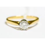 ***AWAY COLLECTED BY VENDOR 16/1***A diamond solitaire 18ct gold ring, the claw set diamond weighing