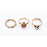 A 9ct gold and diamond ring, size L1/2, along with a 9ct gold and garnet set clustering, size M
