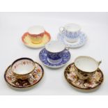 Five late 19th and early 20th Century Osmaston Road Royal Crown Derby factory cups and saucers, in