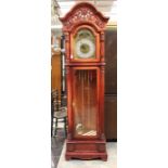 A 20th Century mahogany carved Longcase clock.