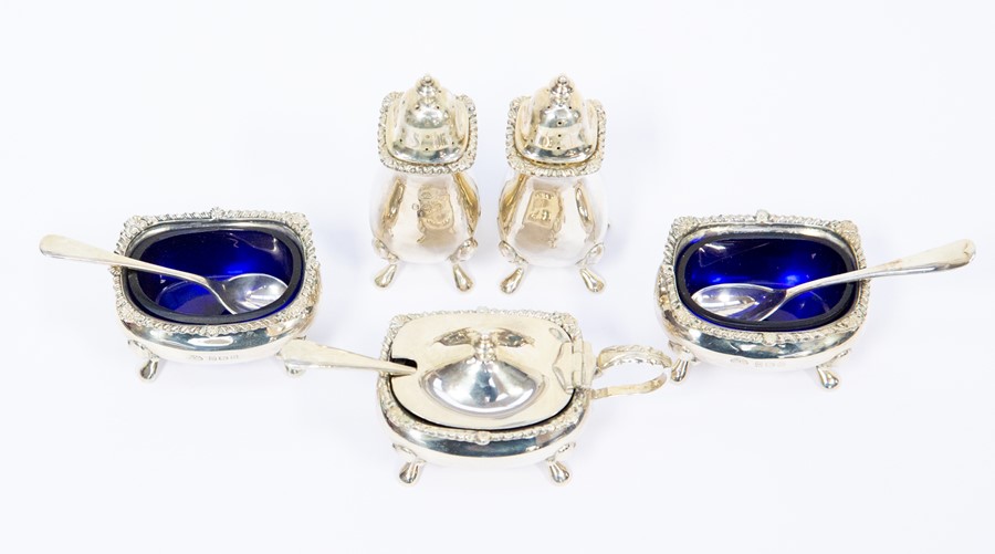 A silver cruet set including salt and pepper, mustard pot and salts, three spoons (1 bag)