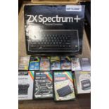 A Sinclair ZX Spectrum plus computeer with ten games and a joy stick interface, vendor states in