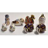 A collection of Royal Crown Derby animal paperweights to include badgers x 2, owl, dragon,