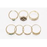 A collection of five various 9ct gold mounted dress rings, to include an emerald trio ring with